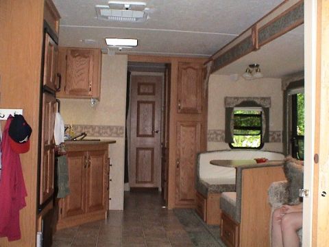 2004 Ford Excursion - View from master bedroom towards back of camper. Kids bunkhouse is in the back to the left.