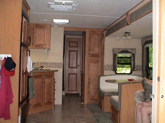 View from master bedroom towards back of camper. Kids bunkhouse is in the back to the left.