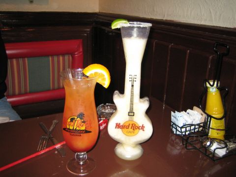 1985 Ford Mustang - A Hurricane cocktail from Hard Rock Cafe Tijuana sits next to a frozen drink in a guitar-shaped glass from Hard Rock Cafe.