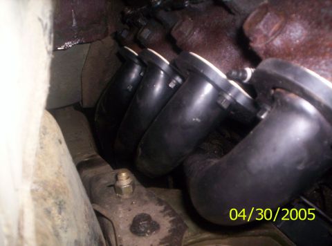 1985 Ford Bronco - The image shows a close-up view of an exhaust manifold with multiple pipes, dated April 30, 2005.