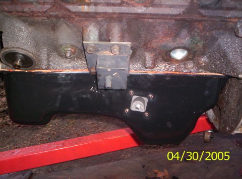 1985 Ford Bronco - Close-up of an engine oil pan, likely during maintenance or repair, with a date stamp indicating April 30, 2005.