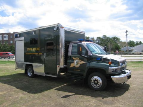 1991 Ford LTD Crown Victoria - This state police truck is marked as an explosives disposal unit, indicating its specialized function.