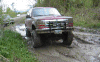 1991 Ford Explorer - This 1991 Ford Explorer is seen from the front, navigating a muddy, off-road path.
