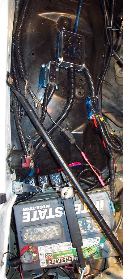 1985 Ford LTD Crown Victoria - Underhood view of a 1985 Ford Crown Victoria LTD, showing the battery and complex wiring.