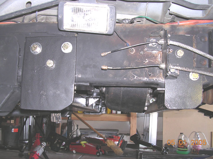 I ended up keeping the e brake bracket in the stock position (except for 3/8" off the frame noe for the bracket) and rerouted the rear e brake lines to allow for the 4" stretch