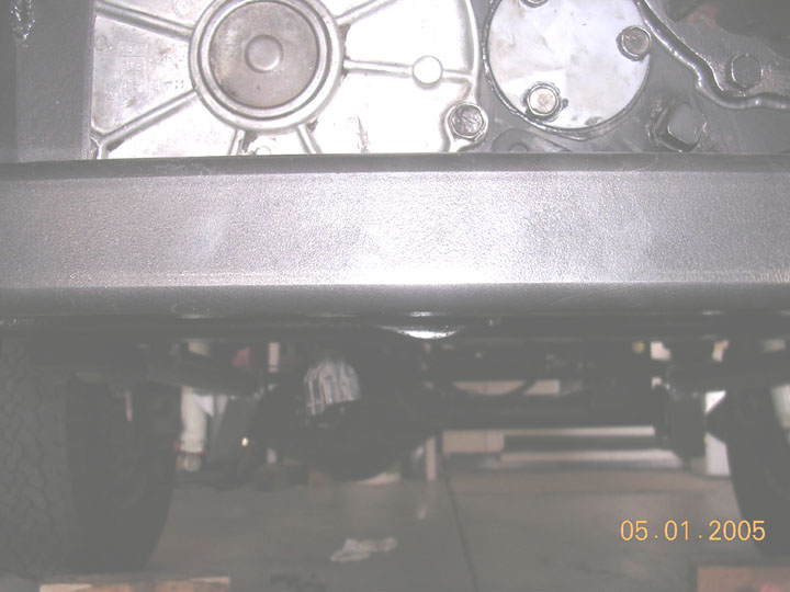 its a bad pic, but the 205 hangs down about .5 inches below the XMs