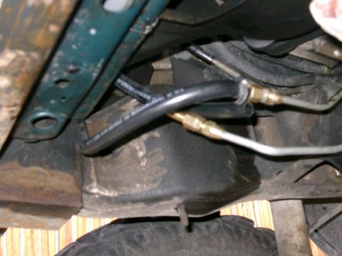 1996 Ford Bronco - Detail of how I adapted the tranny cooler lines from the tranny. I used 5/16" flare fitting to 5/16" to 1/4" male fitting. Then a 1/4" to 3…