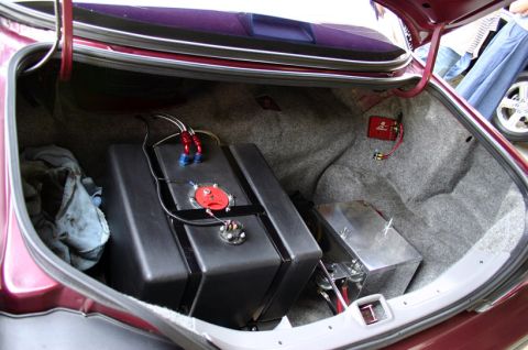 1992 Ford Crown Victoria - The trunk of a car modified with a large fuel cell and battery box.