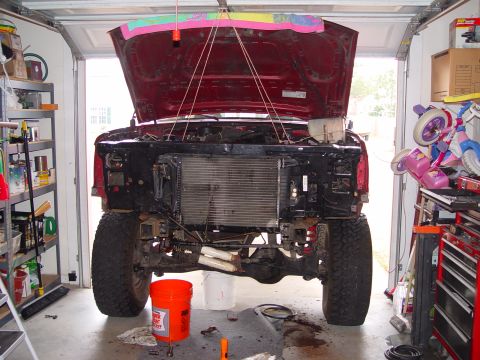 1994 Ford Bronco - I did have to remove the tranny cooler. Have a bucket ready. Fluid loss was very little
