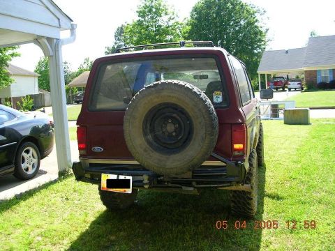 1989 Ford Bronco II - Rear view of a 1989 Ford Bronco II, showing the spare tire and bumper.