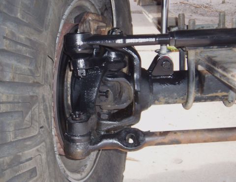 1996 Ford Bronco - High Steer knuckle, and arm. Custom made by Chad Vandall at Outer Limit Motorsports. The drag link is made from .188 wall DOM, and tapped a…
