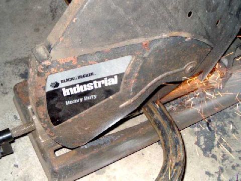 1984 Ford Bronco - Cutting the tubing on a chop saw.