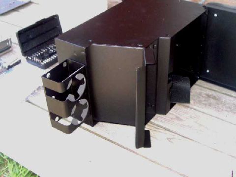 1984 Ford Bronco - Bolt the cup holder to the front or rear of the console. I'll try the front.