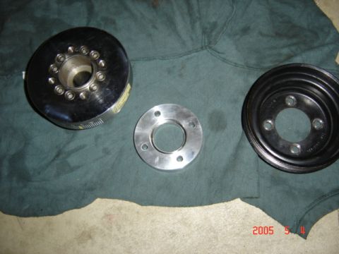 1990 Ford Bronco - Fuild damper with 5/8" spacer from March performance pulleys. The fluid damper is 5/8" shorter then the stock harmonic balancer.