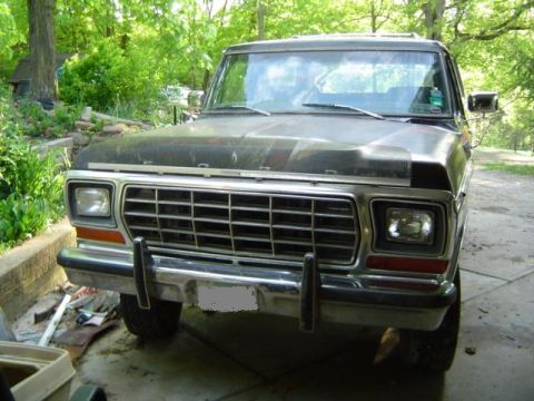 1979 Ford Bronco - Front view of a 1979 Ford Bronco with a chrome grille and bumper.