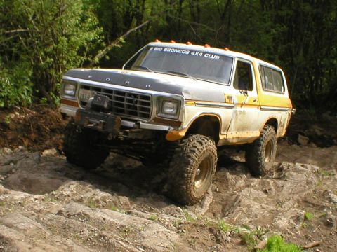 1978 Ford Bronco - Modified 1978 Ford Bronco tackling a challenging off-road course.