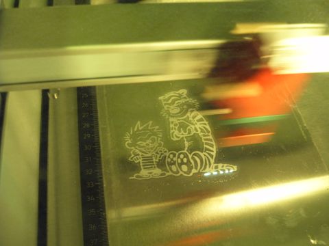1988 Ford Bronco - Etched Calvin and Hobbes sticker on metal plate with ruler markings. SUPERMOTORS.NET logo present.