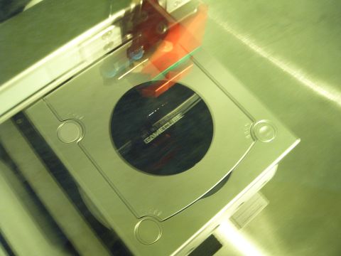 1988 Ford Bronco - A silver Nintendo GameCube console is shown from a top-down perspective.