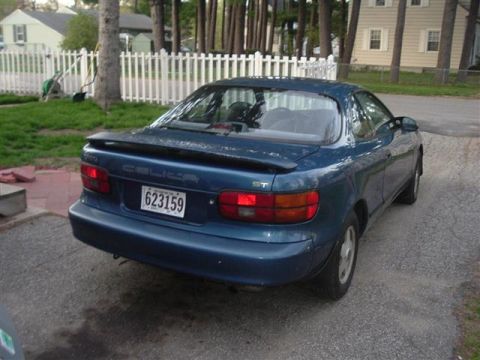 1990 Toyota Celica - This 1990 Toyota Celica ST is seen from the rear, displaying its distinctive body style and a clear license plate.