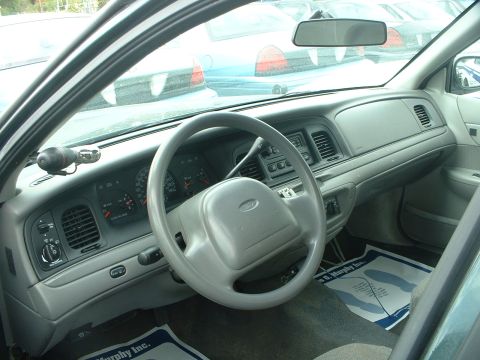 1999 Ford Crown Victoria - Interior view of a 1998 Ford Crown Victoria, showing the dashboard and steering wheel.