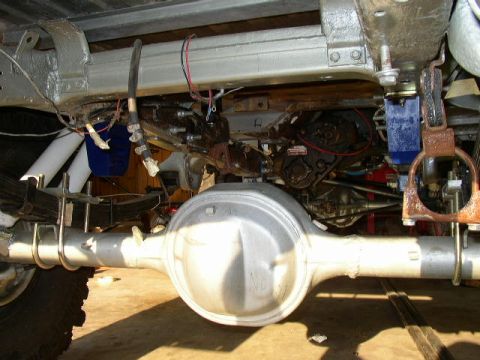 1995 Ford Bronco - Undercarriage detail with focus on rear axle and suspension components.