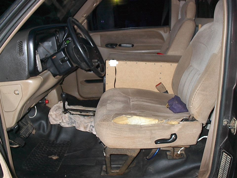 Interior of a 1997 Dodge 1500 showing driver's seat and dashboard