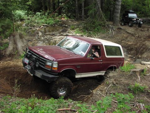1993 Ford Bronco - This 1993 Ford Bronco is tackling a challenging off-road course.