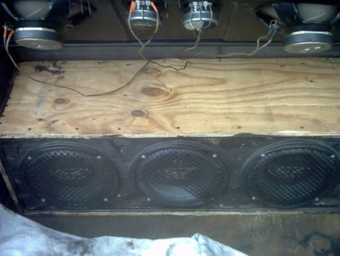1991 Ford Escort - A close-up view of a custom-built speaker enclosure, multiple audio drivers.