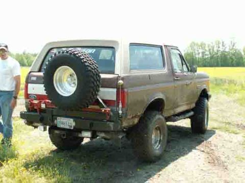 1988 Ford Bronco - This 1988 Ford Bronco is shown from the rear, equipped with a spare tire mounted on the tailgate.