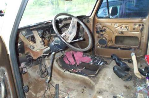 1979 Ford Bronco - The interior of this vehicle appears to be undergoing restoration or repair, with many components disassembled.