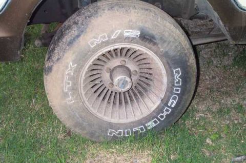 1979 Ford Bronco - A close-up view of a tire and wheel assembly on a vehicle, showing the Michelin brand.