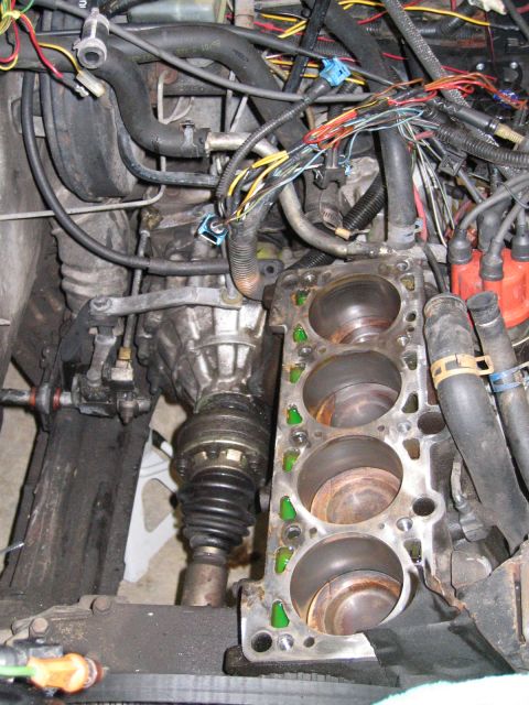 1987 Volkswagen Golf - Close-up view of an engine's internal components, including the cylinder block and transmission assembly.