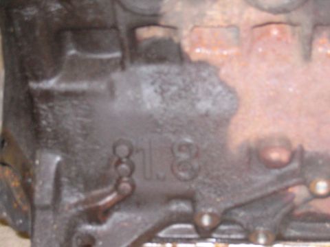 1987 Volkswagen Golf - Close-up of an engine block casting with a "1.8" marking visible.