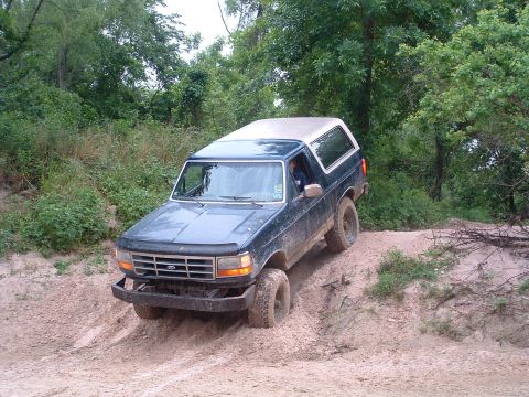 1993 Ford Bronco - This 1993 Ford Bronco navigates a challenging off-road trail.