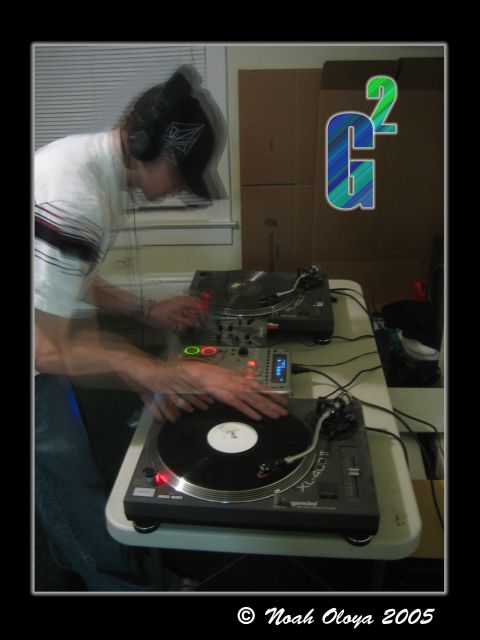 1995 Ford Probe - A DJ is focused on mixing music on two turntables and a mixer.
