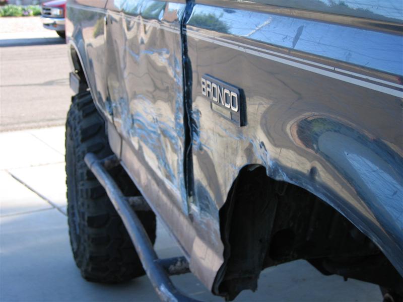 Charcoal Ford Bronco lower body with BRONCO badge and tube rock sliders