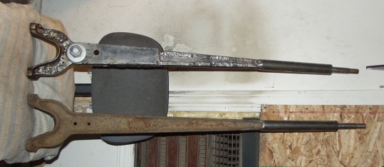 extensions fitted to arms, one wristed