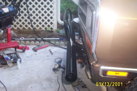 1979 Ford F-150 - Side view of a 1979 Ford F-150 with a new exhaust pipe installed.