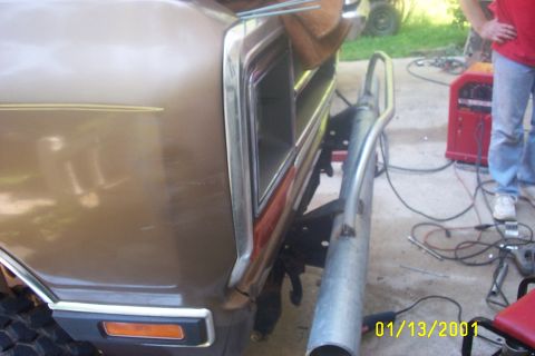 1979 Ford F-150 - The front corner of a 1979 Ford F-150 pickup truck is visible, a custom bumper and a portion of the grille. A date stamp indicates the phot…
