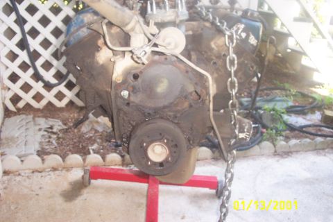 1979 Ford F-150 - This engine block is mounted on a red stand and appears to be in a state of disrepair.