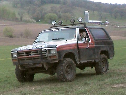 1977 Ford F-150 - This Ford Bronco, likely a 1978 model, is equipped for off-road adventures with its lifted suspension and extra lighting.