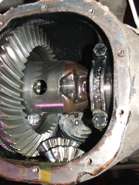 1989 Ford Bronco - Differential gears are visible within the housing, including the ring gear and spider gears.