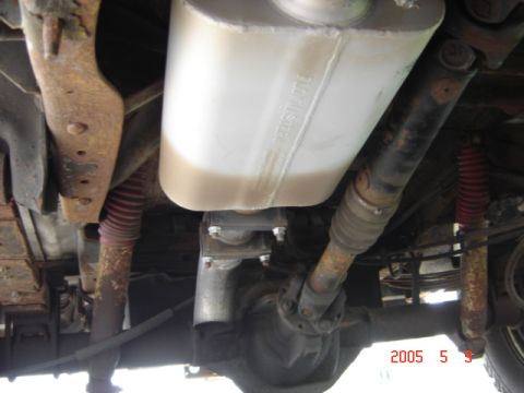 1990 Ford Bronco - Flowmaster muffler, exhaust dumps right in front of axle.