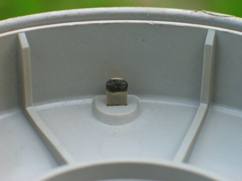 1995 Ford Bronco - This is a close-up view of a single contact point within a distributor cap.
