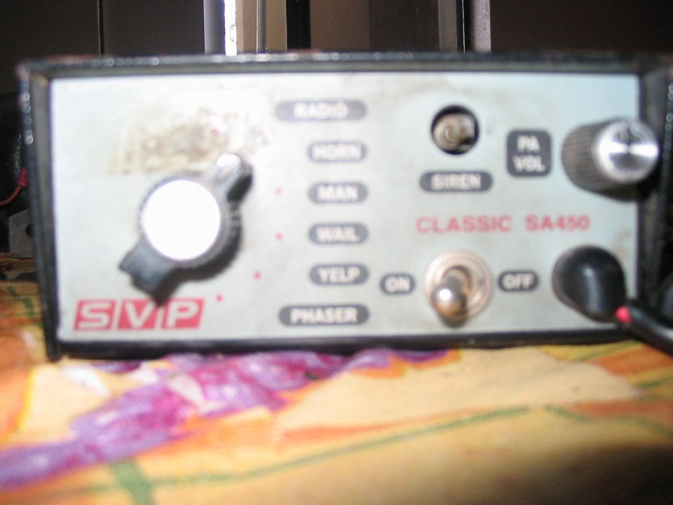 SVP Classic SA450 radio with knobs and switches for radio, horn, man, mail, yelp, and phaser functions