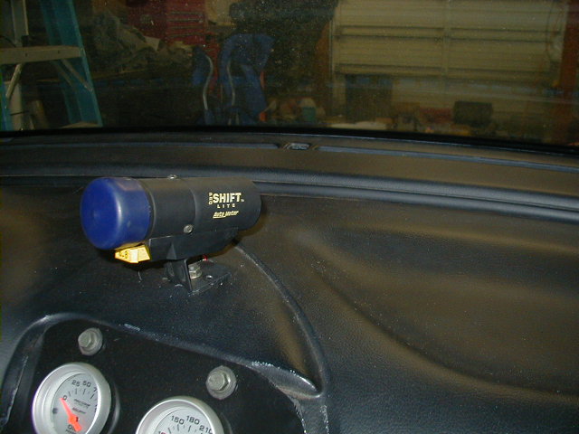 Dashboard with Shift-Lite and two gauges, one marked 0-60 and the other 0-180