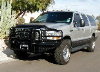 2002 Ford Excursion - 2000 Ford Excursion SUV, silver exterior, equipped with a heavy-duty black bull bar and off-road tires.