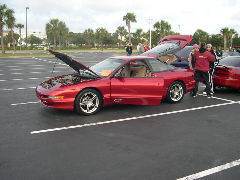 Slimm GT's car at the  show .. wait  what is this in the background is that CrimsonRed  Spittin some game?