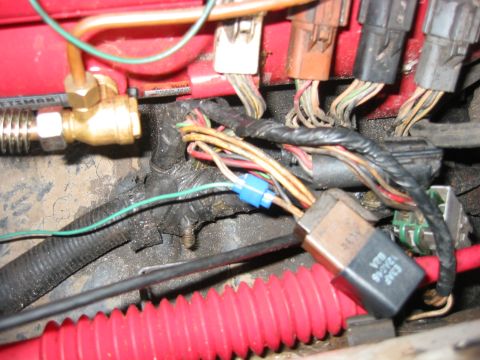 1989 Ford Bronco - This is a blue/white wire to either the EEC or Fuel Pump relay. It is the most convenient tie-in I could find for the fan controller.