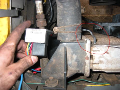 1989 Ford Bronco - Temperature probe installed right next to the inlet coolant hose. Its a nice tight fit, I cant imagine it will wiggle loose over time, but…